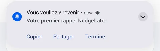 Une notification NudgeLater pour du texte partagé, avec les boutons Copier, Partager et Terminé.